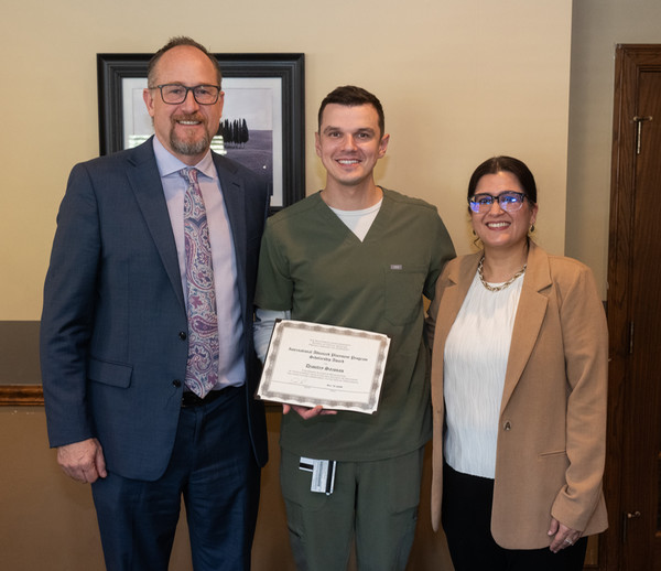 Dean of SIU SDM student awardee and parent