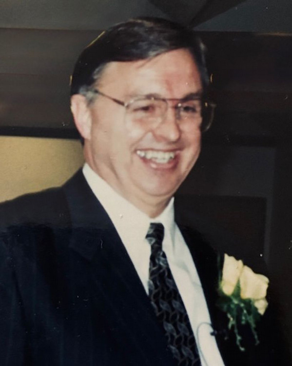 Portrait of Frank Crain in a suit