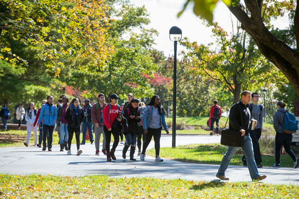 Group of students walking on campus