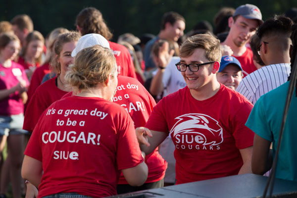 students at playfair in SIUE shirts