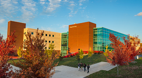 sunset on modern engineering building in fall