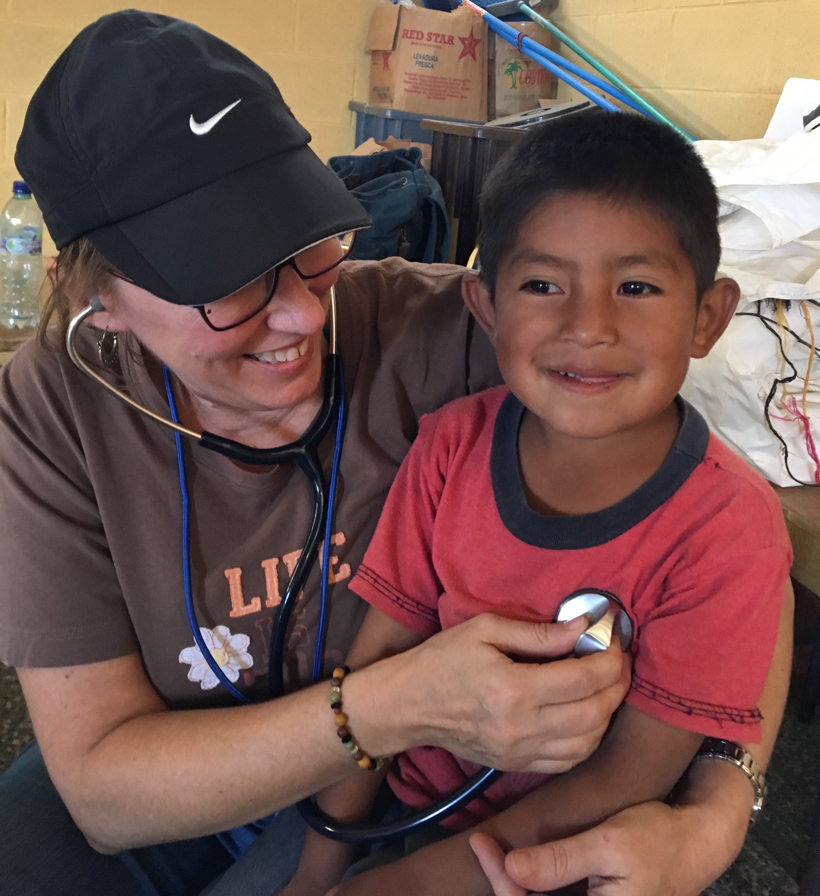 Deborah Horton caring for a patient in Guatemala.