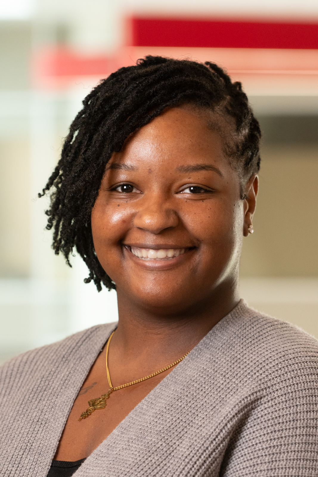 A portrait photo of Jimisha Flowers