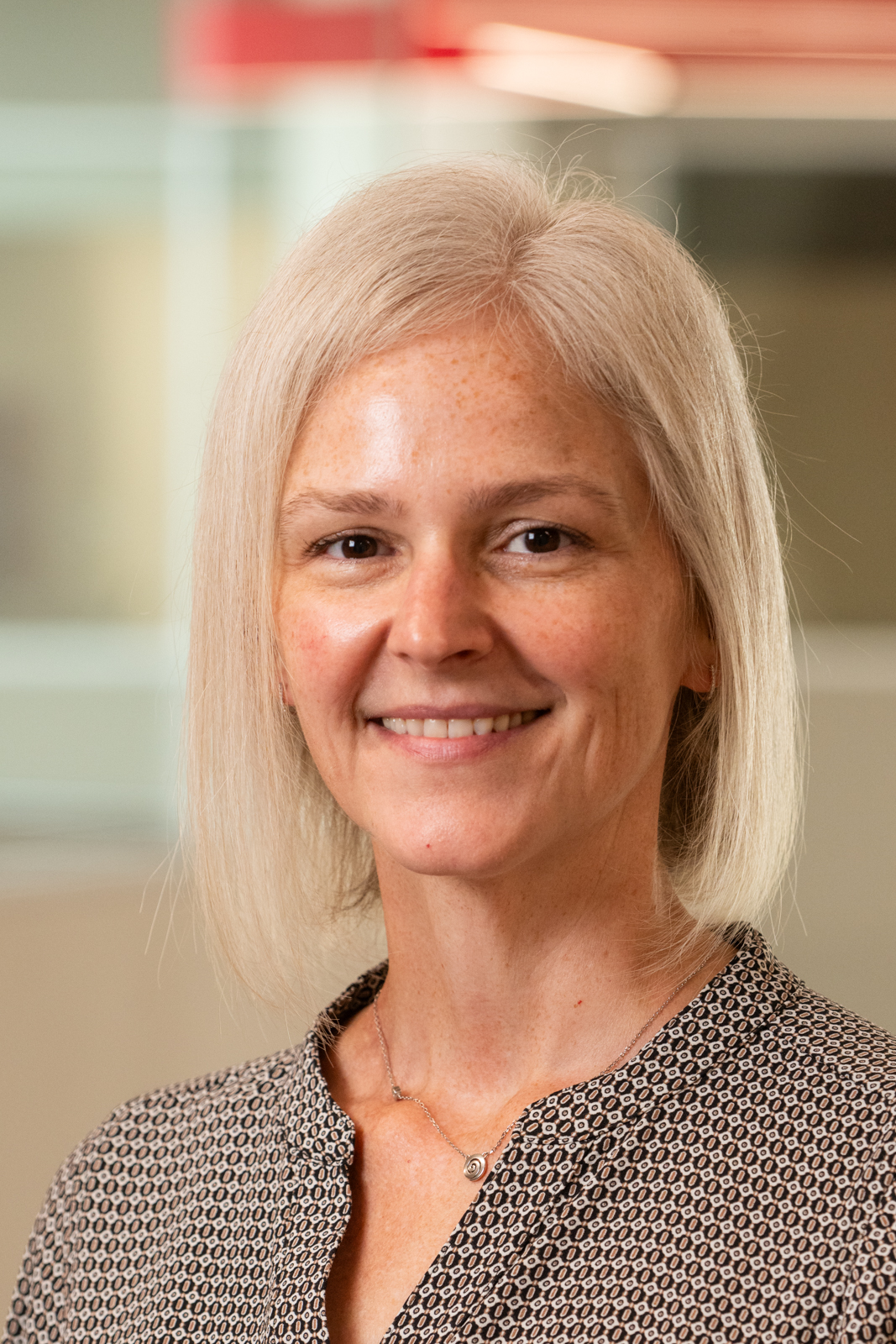 A portrait photo of Erica Frost, PhD, RN, CNE, CCRN