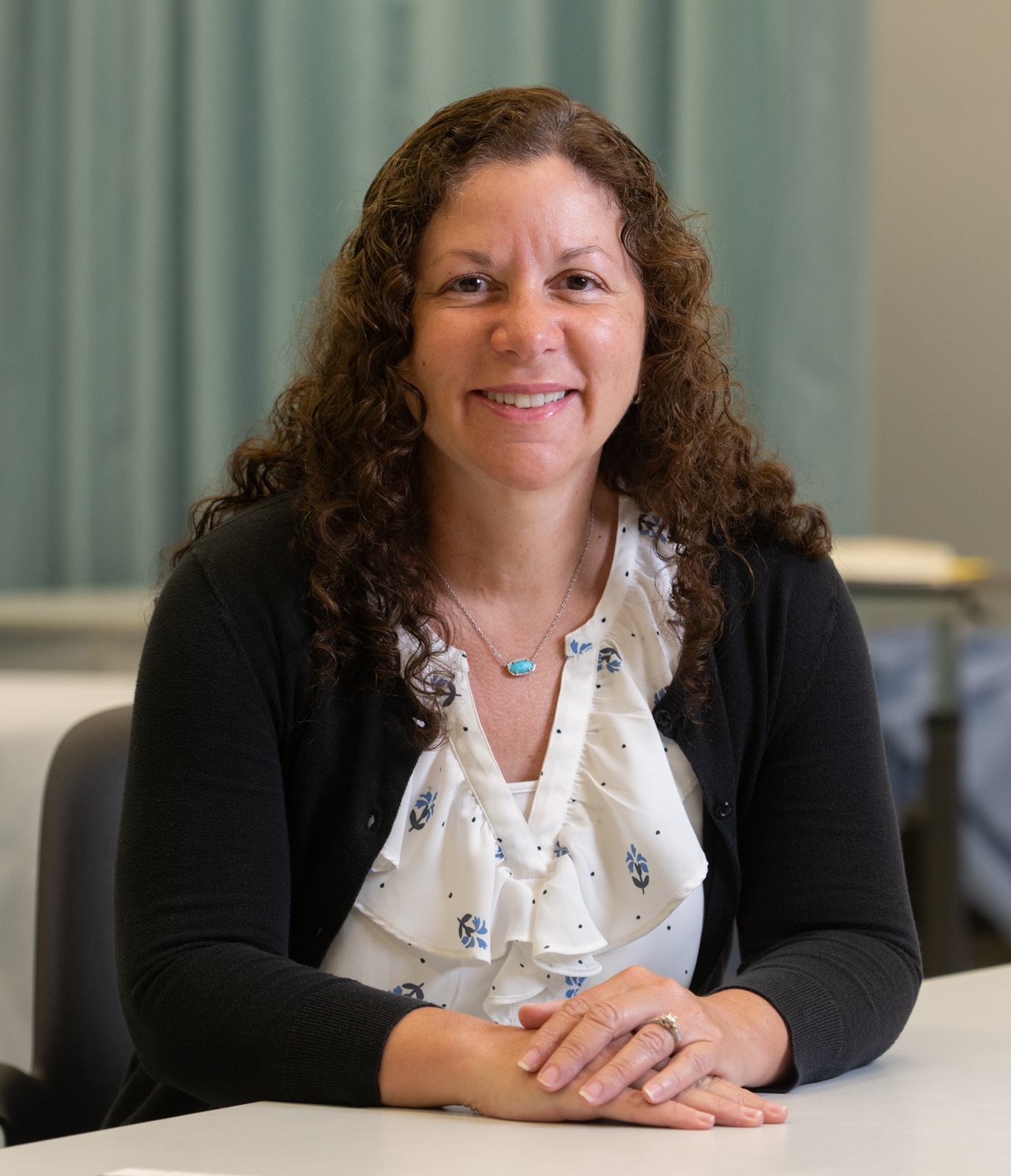 A portrait photo of Amelia Pérez, PhD, RN, CNE