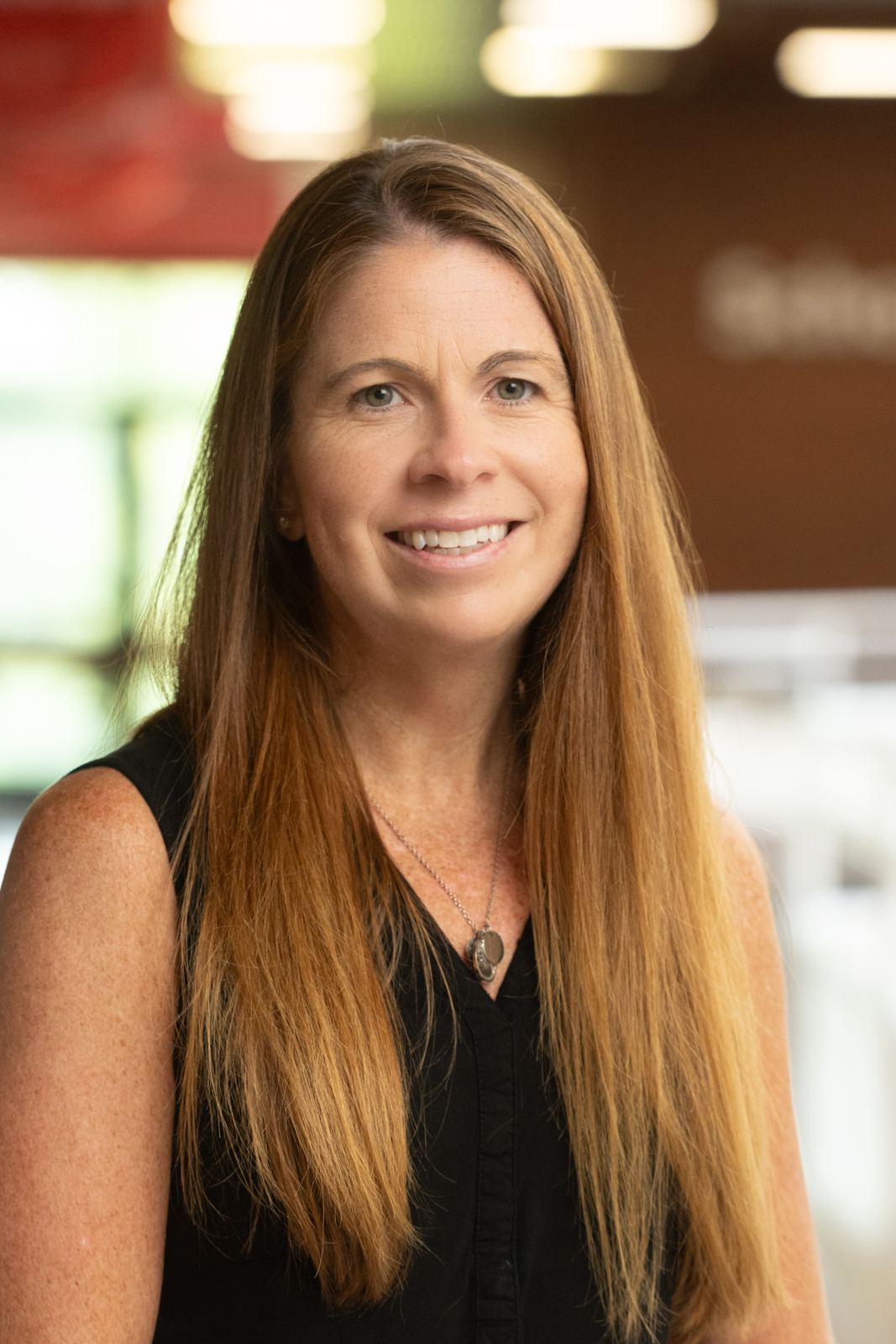 A portrait photo of Kristen Durnan