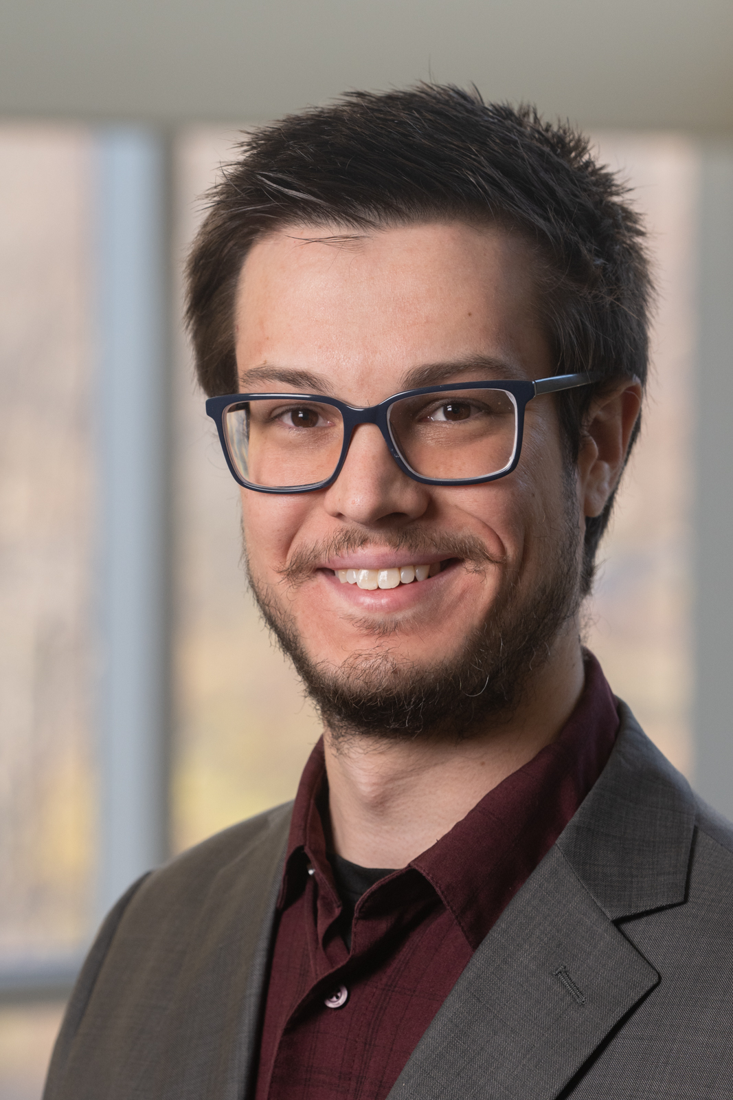 A portrait photo of Joshua Spann