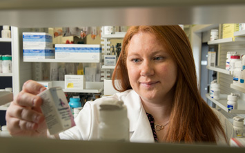 SIUE student in a pharmacy.