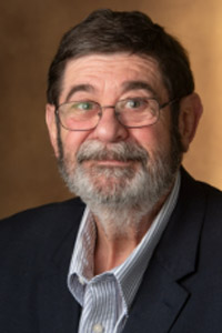 A portrait photo of James (Jim) Robbins
