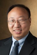 A portrait photo of Dr. Albert C. J. Luo