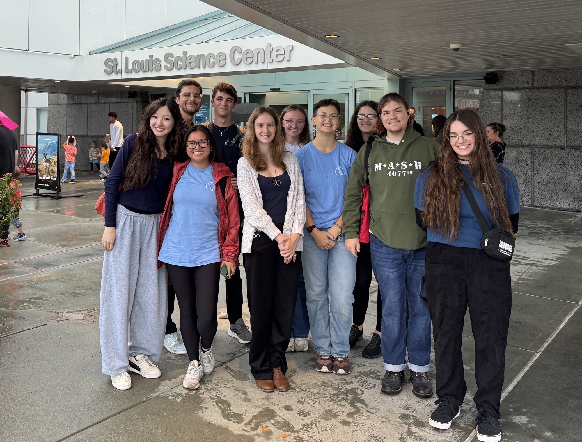 Group shot of attendees in front of the STL Science Center