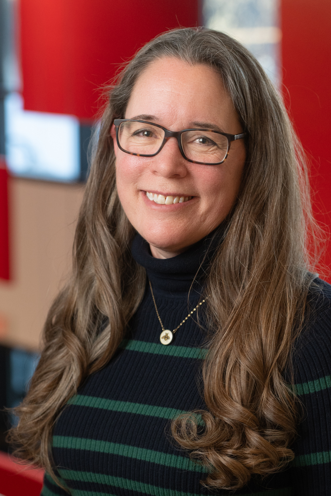 A portrait photo of Amy Perl