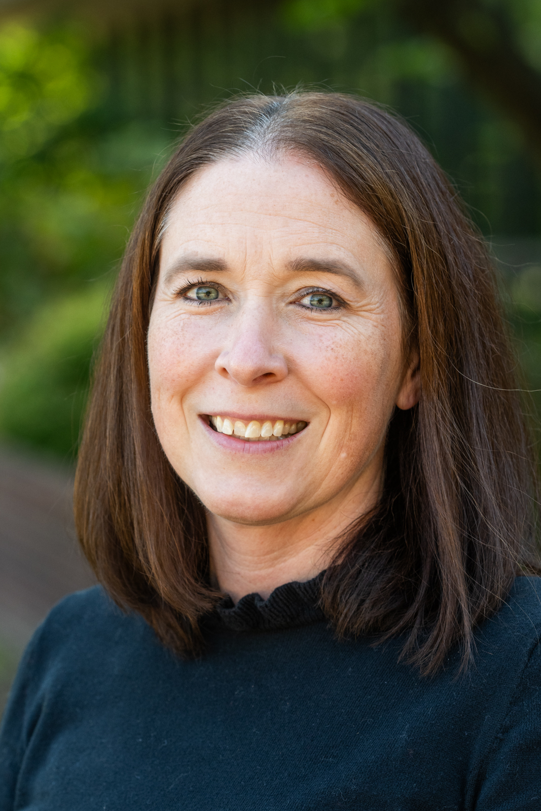 A portrait photo of Tiffany James