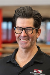 A portrait photo of Dennis Wobbe