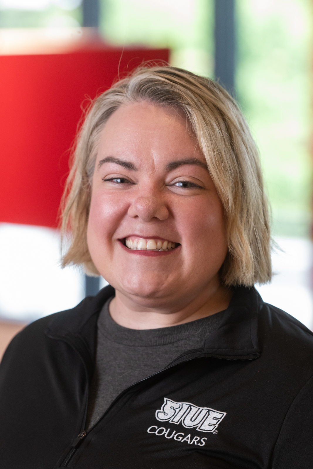 A portrait photo of Megan Farmer (She/Her)